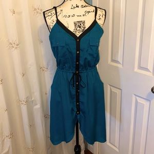 Beautiful hunter green dress with black trim.